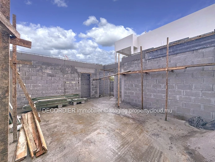 Elegant villa under construction with pool & garden