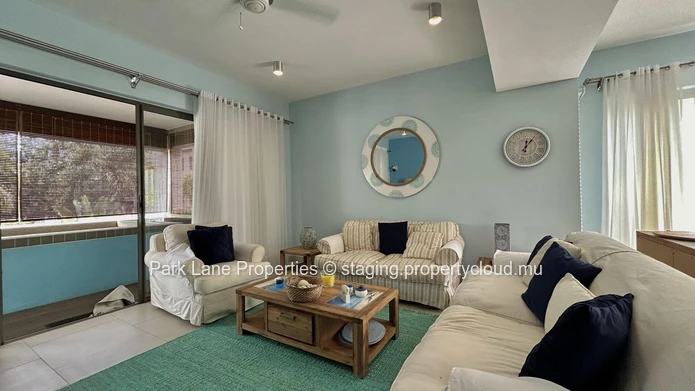 Appartement confortable de 3 chambres avec terrasse, piscine et accès à la plage à Pereybere
