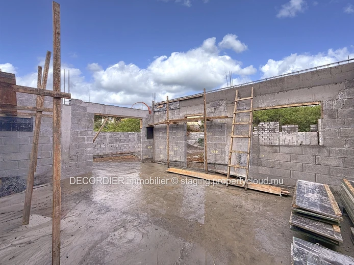 Elegant villa under construction with pool & garden