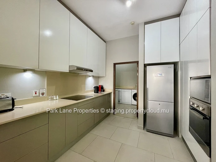 Beach access is just a short stroll from this lovely property.