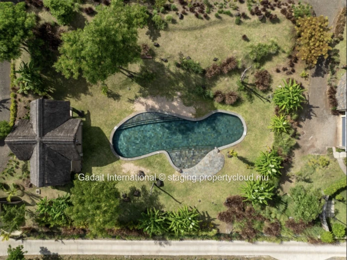 Villa tropicale de luxe avec piscine, accès bateau et prestations haut de gamme à Rivière Noire, Île Maurice