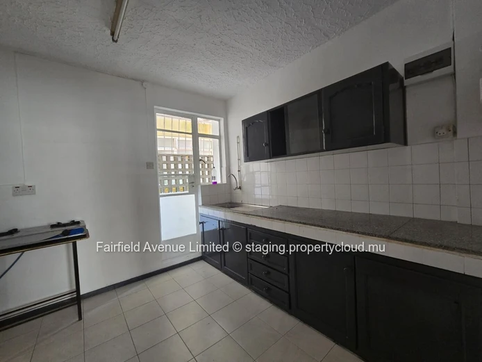 Modern Furnished Apartment in Rose Hill with Guarded Parking, Balcony, and Close to Schools and Shops - Rs 20,000/mo.
