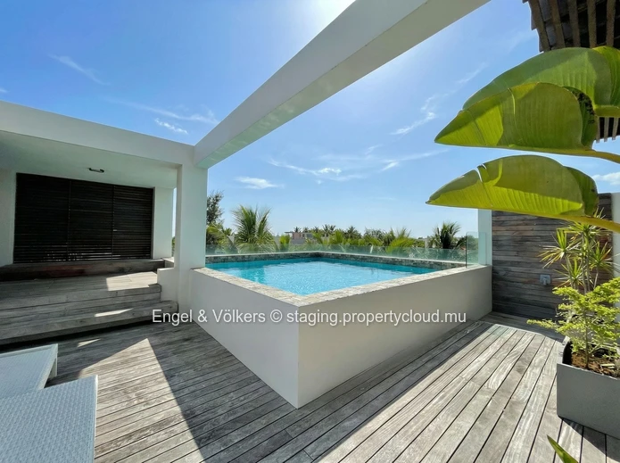 Sleek Seaside Penthouse Living, Steps from the Beach