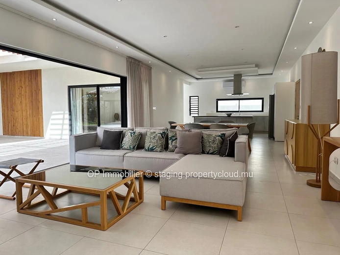 "Exquisite 4-bedroom home with private pool in Grand Baie, fully furnished, close to amenities. Price: €25M"