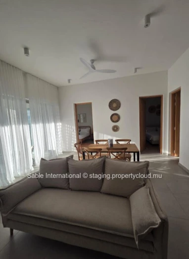 Luxury Penthouse with Pool Access in Péreybère! 2 Beds, Rooftop, Sea Access, Parking, AC. Close to Shops & Hospital.