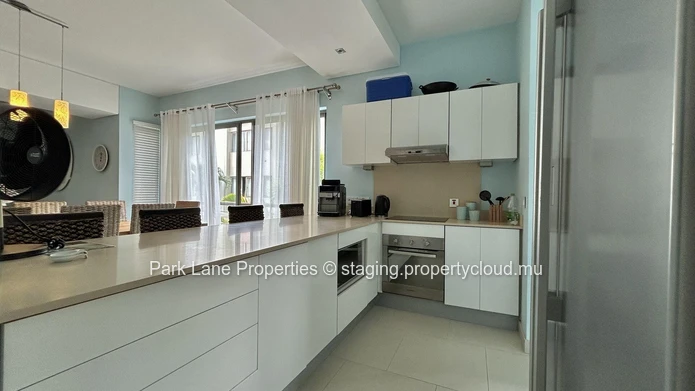 Appartement confortable de 3 chambres avec terrasse, piscine et accès à la plage à Pereybere