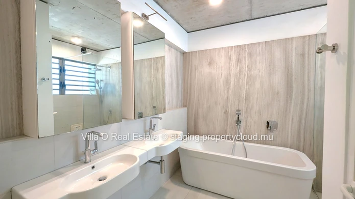 Nestled in the heart of Floreal, this architectural gem offers a modern lifestyle with an omnipresent nature that ill... (Sole Mandate)