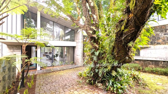 Nestled in the heart of Floreal, this architectural gem offers a modern lifestyle with an omnipresent nature that ill... (Sole Mandate)