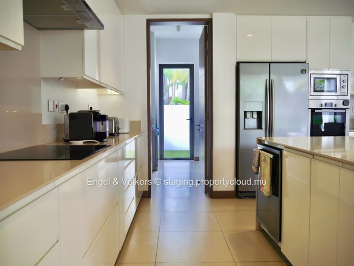 Elegant Four-Bedroom Villa with Private Beach Access