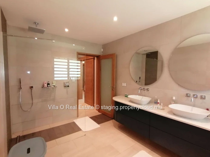 Gorgeous villa completely renovated, with multiple openings to a very large terrace and its lovely pool, overlooking ...