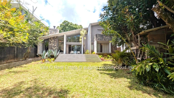 Nestled in the heart of Floreal, this architectural gem offers a modern lifestyle with an omnipresent nature that ill... (Sole Mandate)