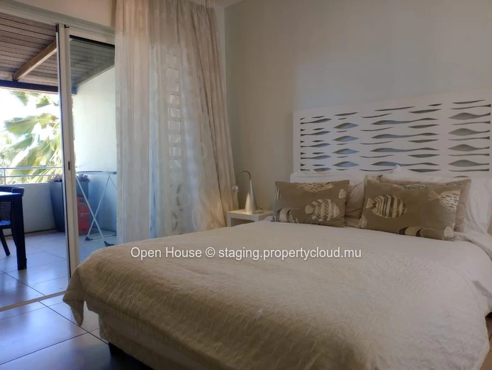 Superb beachfront Penthouse for sale in Pointe aux Biches, 3 bedrooms, communal pool, price Rs 28M. Don't miss out!