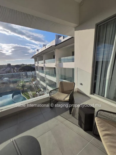 Luxury Penthouse with Pool Access in Péreybère! 2 Beds, Rooftop, Sea Access, Parking, AC. Close to Shops & Hospital.