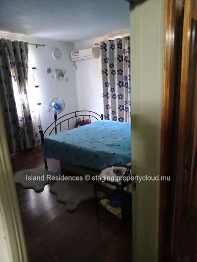 "Charming 5-Bedroom House with Large Yard in Triolet - Rs"