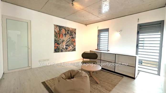 Nestled in the heart of Floreal, this architectural gem offers a modern lifestyle with an omnipresent nature that ill... (Sole Mandate)