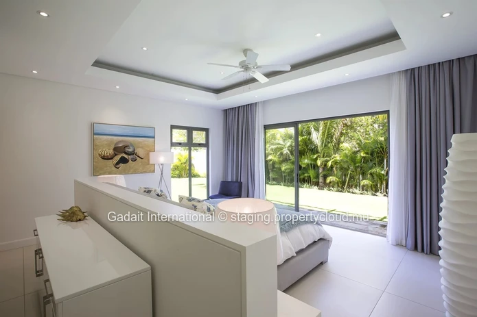 Villa d'exception avec vue panoramique sur le golf à Anahita Beau Champ