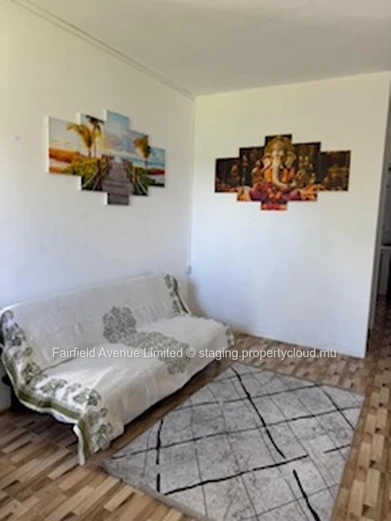 "Charming Furnished Apartment in Calodyne with Parking, Garden, and Close to Amenities - Rs 22,500"