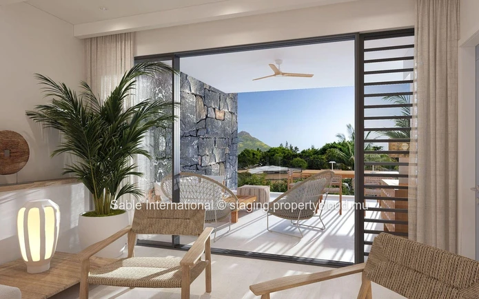 Appartement de luxe en bord de mer avec une vue imprenable sur la mer et des équipements de style resort à Flic en Flac