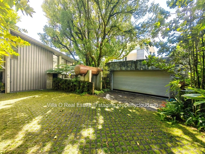 Nestled in the heart of Floreal, this architectural gem offers a modern lifestyle with an omnipresent nature that ill... (Sole Mandate)