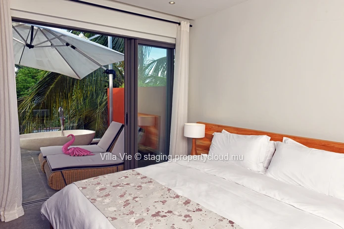 Péreybère - Appartement lumineux de 2 chambres avec piscine commune.