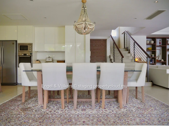 Elegant Four-Bedroom Villa with Private Beach Access