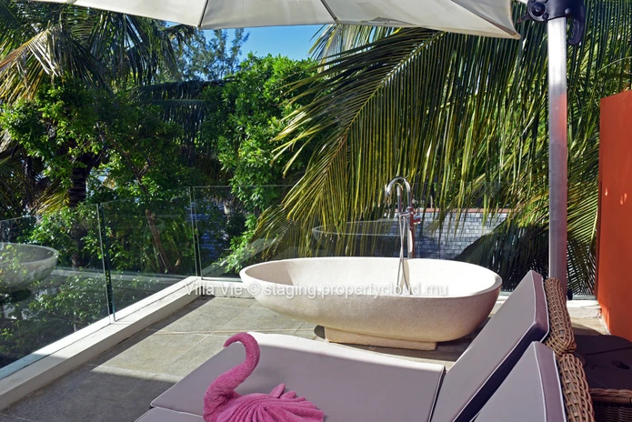 Péreybère - Appartement lumineux de 2 chambres avec piscine commune.