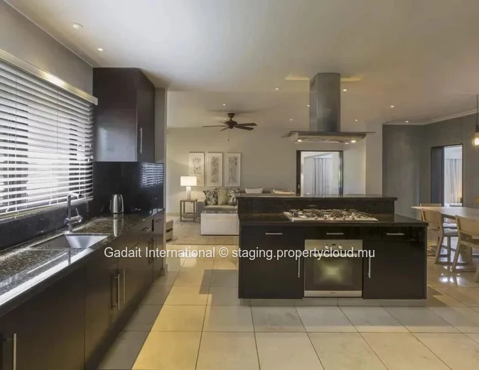 Invest in this villa in the east of Mauritius with private beach and golf access