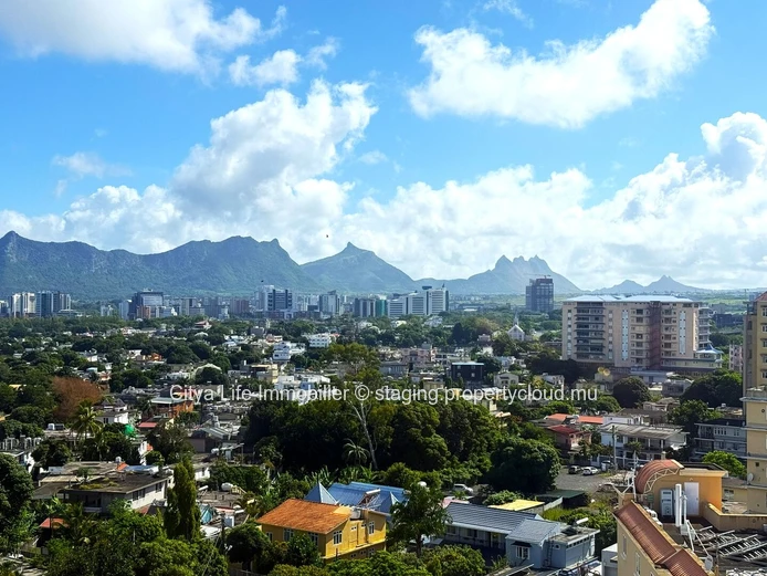 Luxurious 4-Bed penthouse in Quatre Bornes with Rooftop Access & Mountain Views.