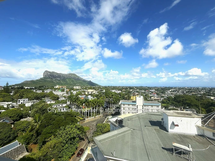 Luxurious 4-Bed penthouse in Quatre Bornes with Rooftop Access & Mountain Views.
