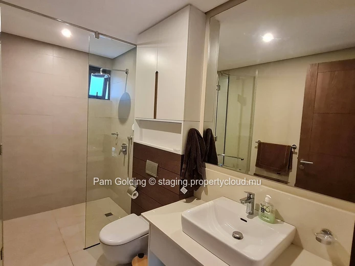Stylish 3-Bedroom Ground-Floor Apartment for Sale in Pointe aux Canonniers - Le Savoy Complex (Sole Mandate)