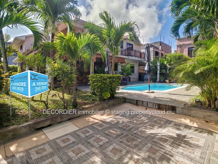 Large detached house with pool and garden with trees