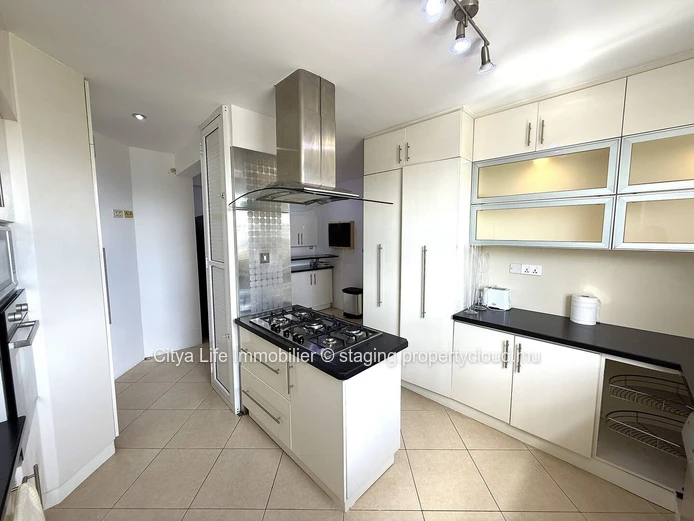 Luxurious 4-Bed penthouse in Quatre Bornes with Rooftop Access & Mountain Views.