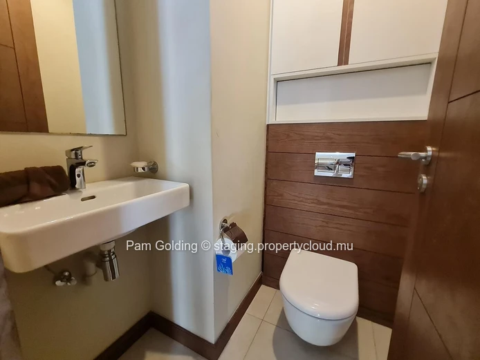 Stylish 3-Bedroom Ground-Floor Apartment for Sale in Pointe aux Canonniers - Le Savoy Complex (Sole Mandate)