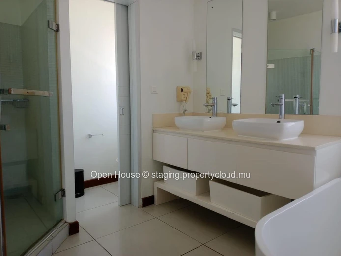 Superb beachfront Penthouse for sale in Pointe aux Biches, 3 bedrooms, communal pool, price Rs 28M. Don't miss out!